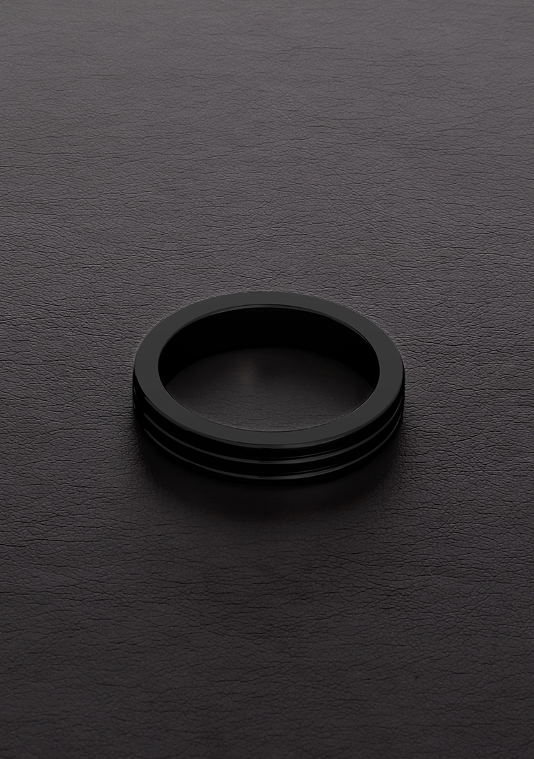 Péniszgyűrű Kokring:Arany Fekete Bordázott C-Gyűrű (10x45mm)